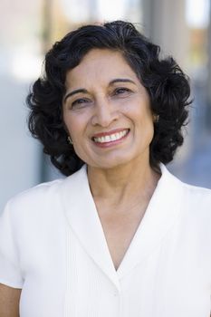 Portrait of a Smiling Indian Businesswoman Standing Outside