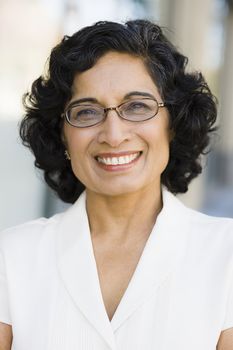 Portrait of a Smiling Indian Businesswoman Wearing Glasses