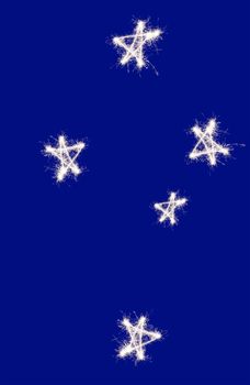 The Southern Cross constellation of Crux as represented on the Australian and New zealand flag, drawn in sparkler trails