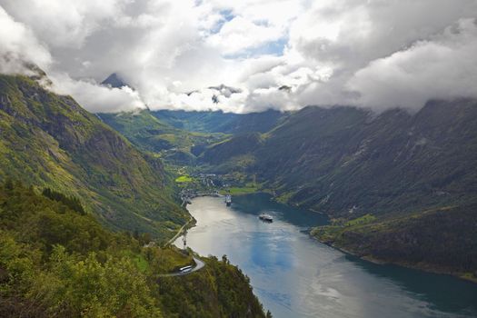 The Geiranger fjord in Norway, surrounded by high mountains