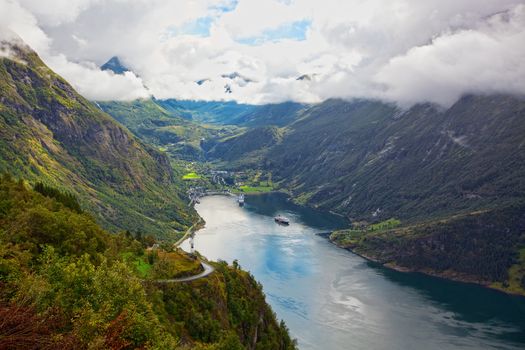 The Geiranger fjord in Norway, surrounded by high mountains