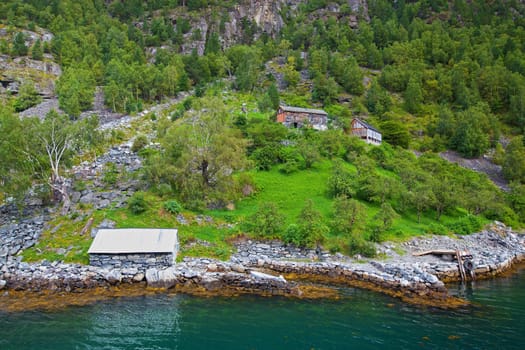 The Geiranger fjord in Norway, surrounded by high mountains