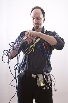 Computer technician entangle in network cable