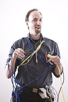 Electronic technician about to do a very bad connection