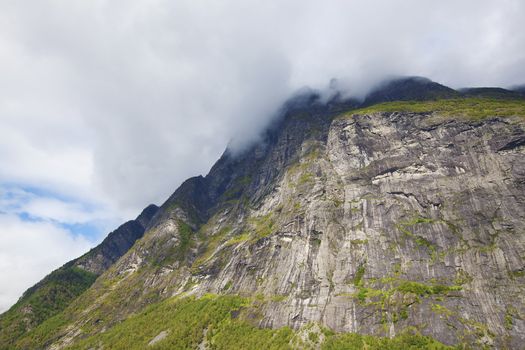 Dramatic skies and mountain range at Geiranger, Norway