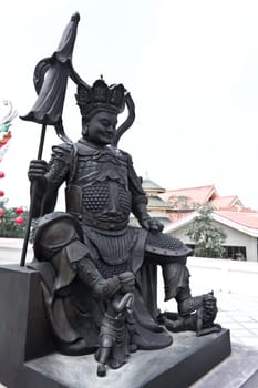 Chinese god sitting statue in chinese temple ,Nakhonnayok ,Thailand