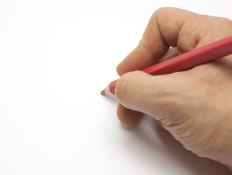 Pencil in man hand isolated on white background
