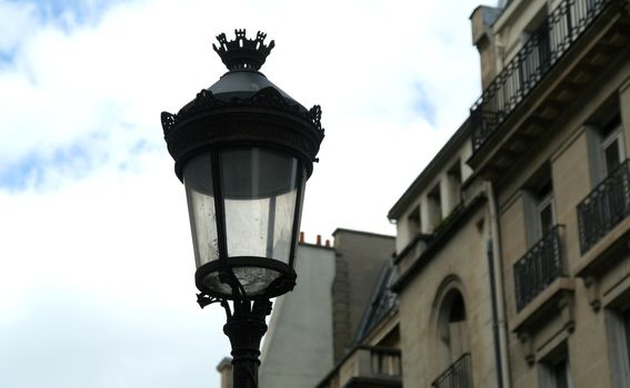 Houses on the streets of the capital of France - Paris. Street lamp.