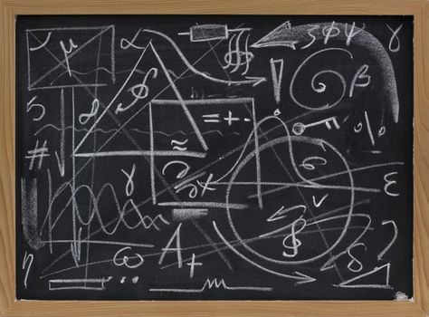 random lines, geometrical shapes, symbols on a blackboard - chaos, mess or information overload concept