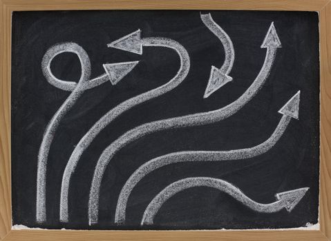 options or alternative solutions concept - line and arrow abstract on blackboard