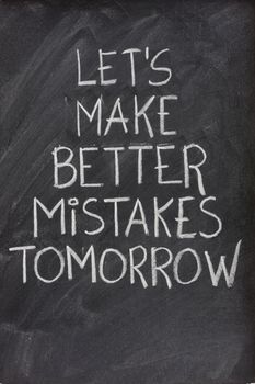 let's make better mistakes tomorrow text handwritten with white chalk on blackboard