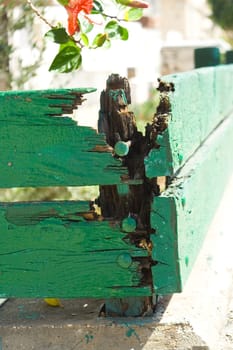 Old weatherd wooden fence boards with rusty nails