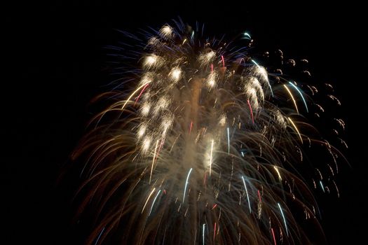 Firework display against black sky