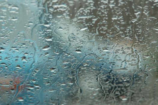  Rain drops on a window of car
