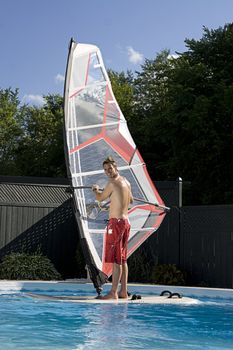 Windsurfer in a backyard pool