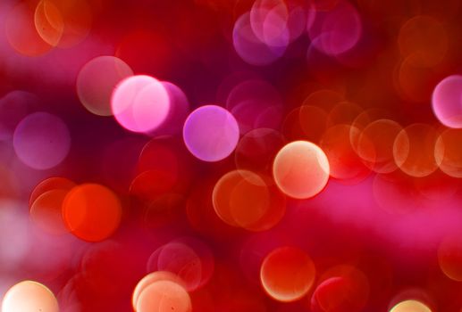 Color Bokeh against a dark background for use at graphic design
