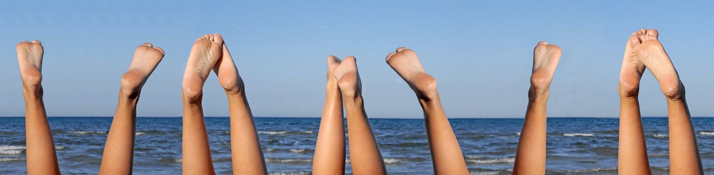 lovely legs on the beach on blue sky