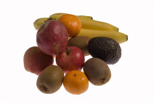 An isolated group of apples, bananas, kiwis, tangerines and an avocato.