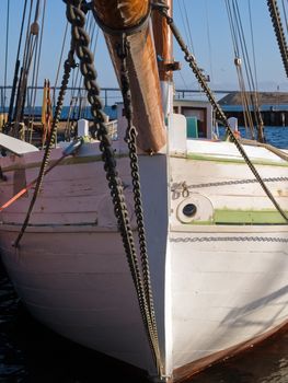 Prow of a traditional vintage classical wood sailboat tall-ship