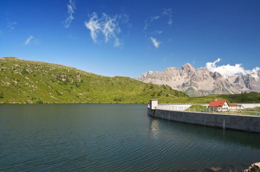 summer view of lake Cavia near San Pellegrino pass, Trentino, Italy 