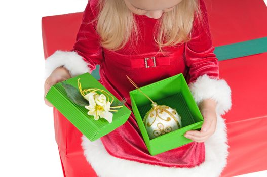 Christmas toddler with present boxes, studio shot