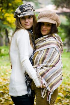 beautiful young woman outdoors portrait in autumn fashion