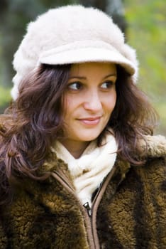 beautiful young woman outdoors portrait in autumn fashion