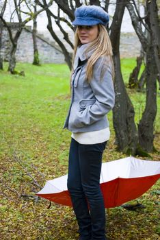 beautiful young woman outdoors portrait in autumn fashion