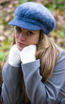 beautiful young woman outdoors portrait in autumn fashion