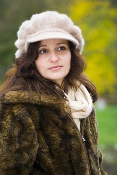 beautiful young woman outdoors portrait in autumn fashion