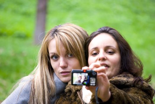 cute girls making photo session in autumn