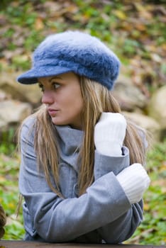 beautiful young woman outdoors portrait in autumn fashion