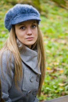 beautiful young woman outdoors portrait in autumn fashion