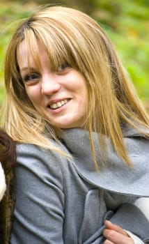 beautiful young woman outdoors portrait in autumn fashion