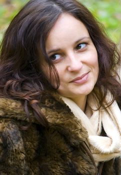 beautiful young woman outdoors portrait in autumn fashion