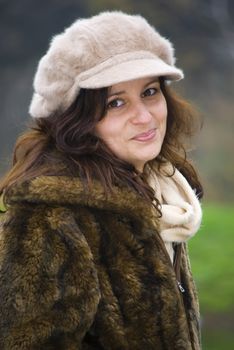 beautiful young woman outdoors portrait in autumn fashion