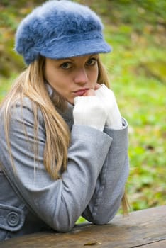 beautiful young woman outdoors portrait in autumn fashion