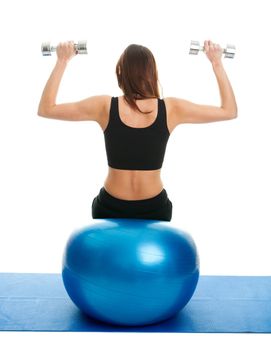 Fitness women doing weightlifting. Shot from behind. Isolated on white