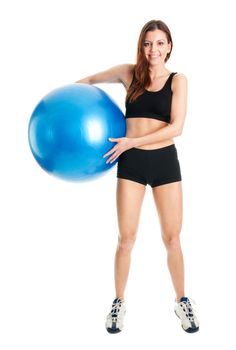 Fitness woman posing with fitness ball. Isolated on white