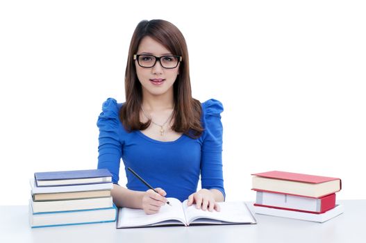 Portrait of a cute female student studying,  isolated on white background.
