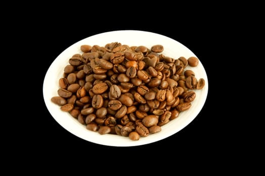 Coffee beans in white plate 