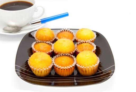 cakes on a plate , isolated over white