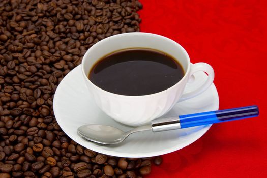 Coffee cup over red background