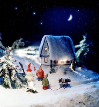 Photo miniature about new year holiday with snowman and childrens