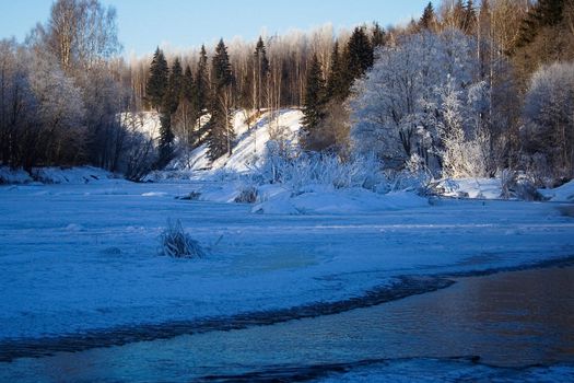 Winter river zigzag, snow tale after new year