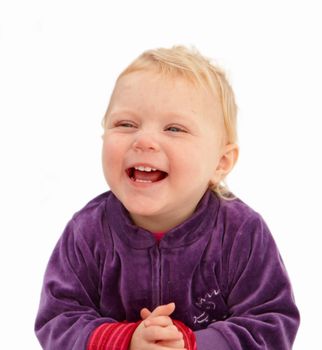 Cute baby girl smiling on white background with copyspace