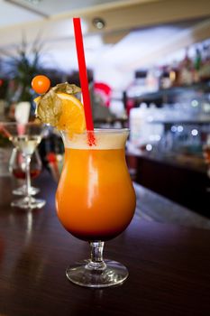 Tequila sunrise cocktail standing on the counter