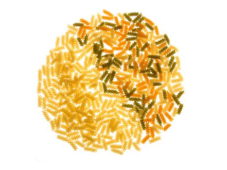 A circle of uncooked pasta isolated over with background.