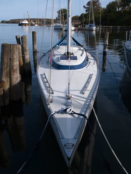 Beautiful modern design sail yacht in a marina