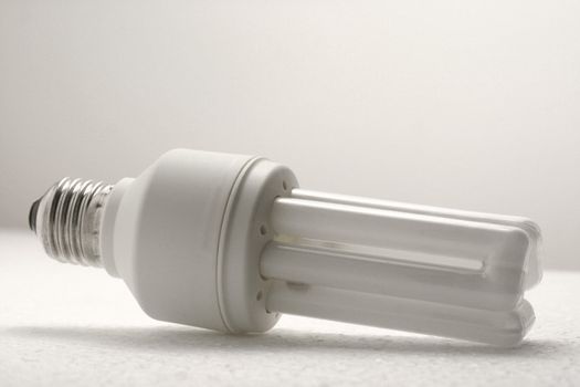 Closeup of a white energy saving light bulb.